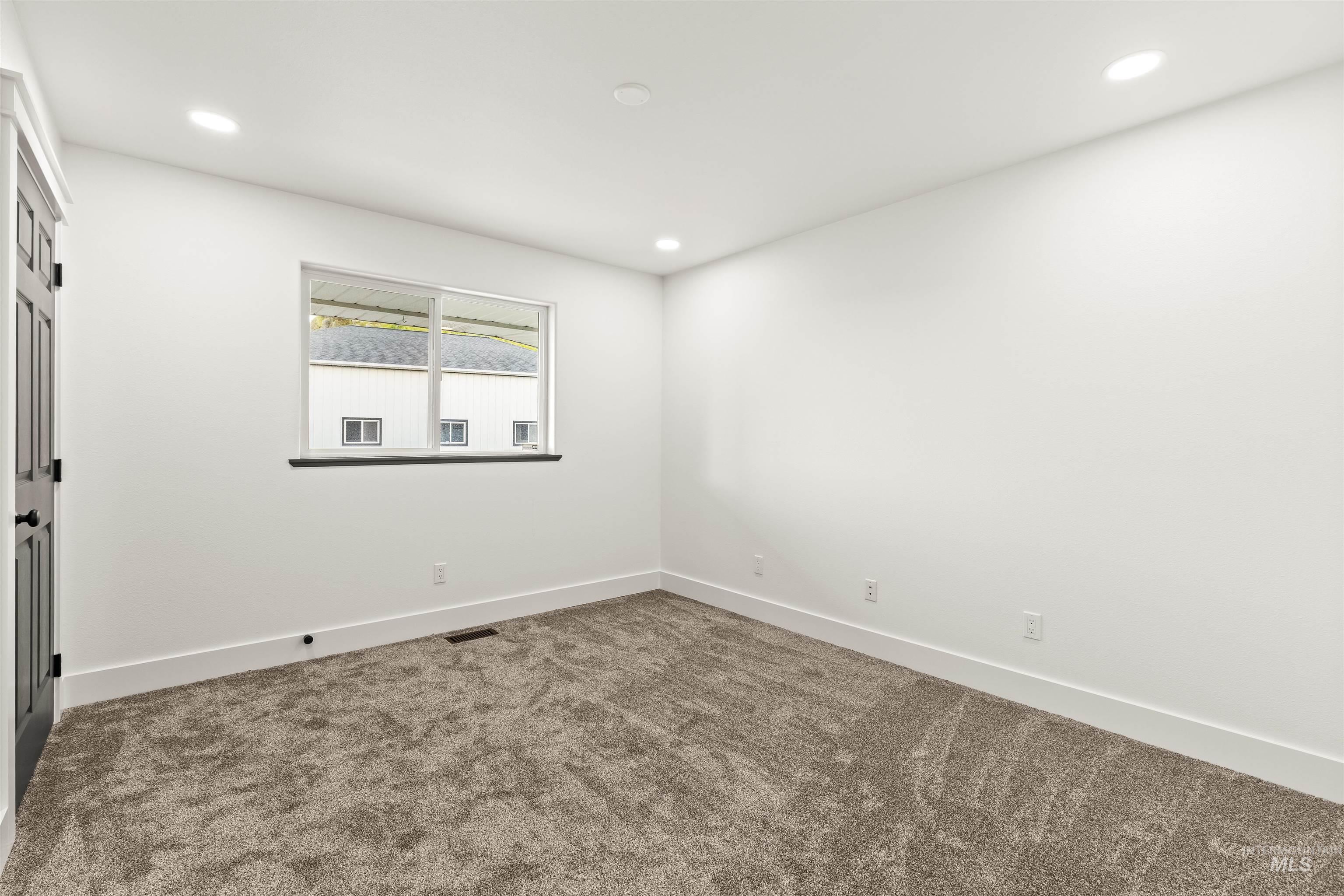 3360 East Main Street Lewiston, ID 83501 - Photo 19 of 50 Interior room featuring plush gray carpeting and white painted walls