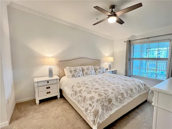 a bathroom with double vanity and a shower