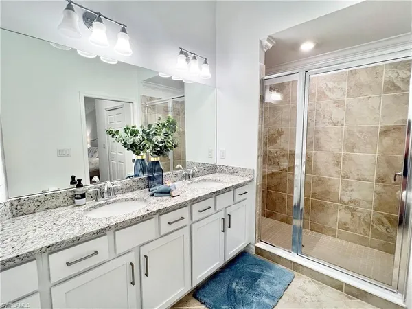 a bed room with a bed and a window