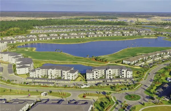 a view of a swimming pool with an ocean view