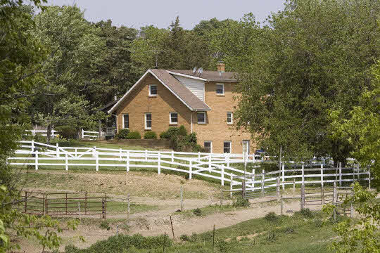 8749 Judd Road Durand, IL 61024 - Photo 2 of 6 a view of a house with backyard