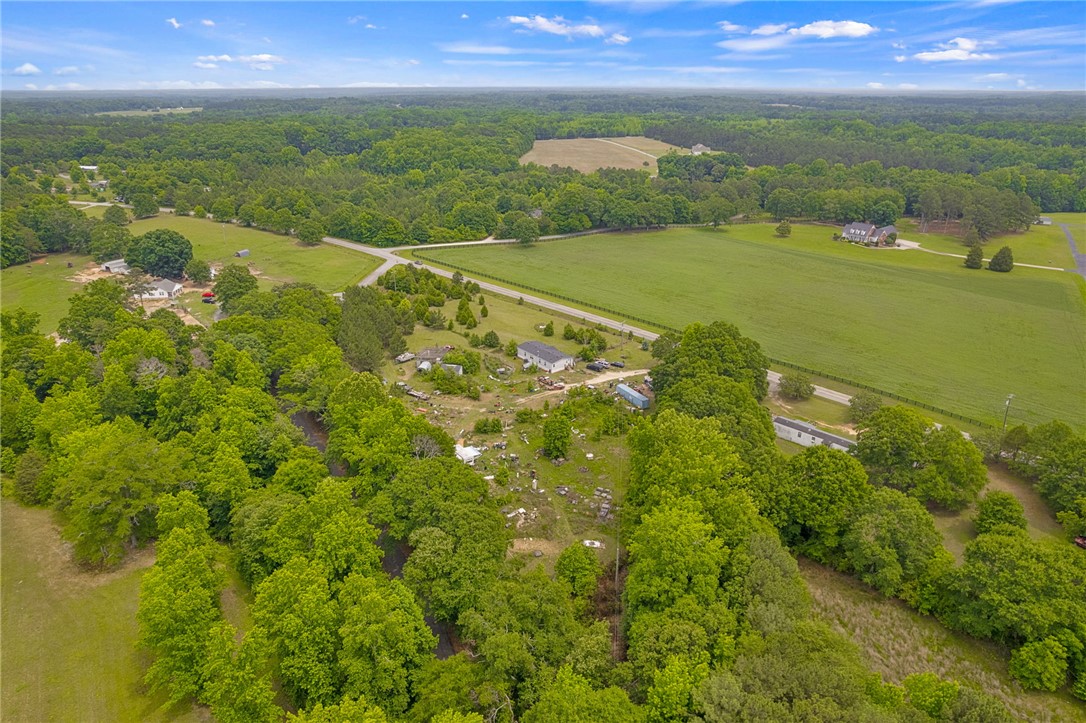 1549 Bethany Church Road Belton, SC 29627 - Photo 3 of 36 Sprawling green landscapes with abundant tree coverage define this tranquil countryside property.