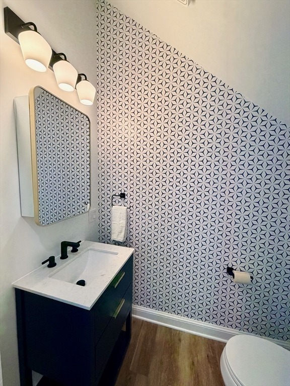 99 Mason Street, Unit 2 Salem, MA 01970 - Photo 11 of 25 a bathroom with a sink toilet and mirror