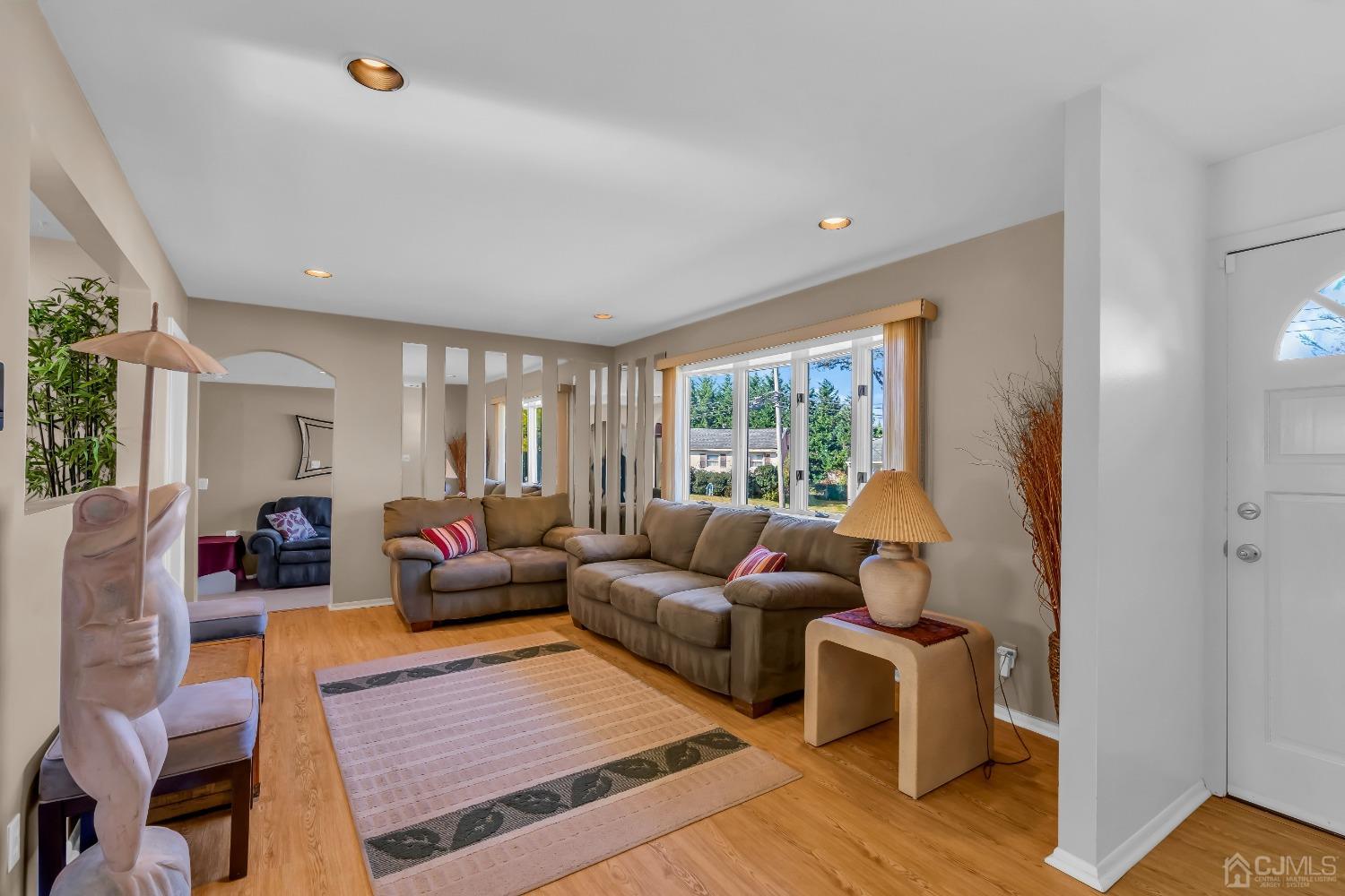 6 Georgetown Road Old Bridge, NJ 08859 - Photo 6 of 45 a living room with furniture and wooden floor