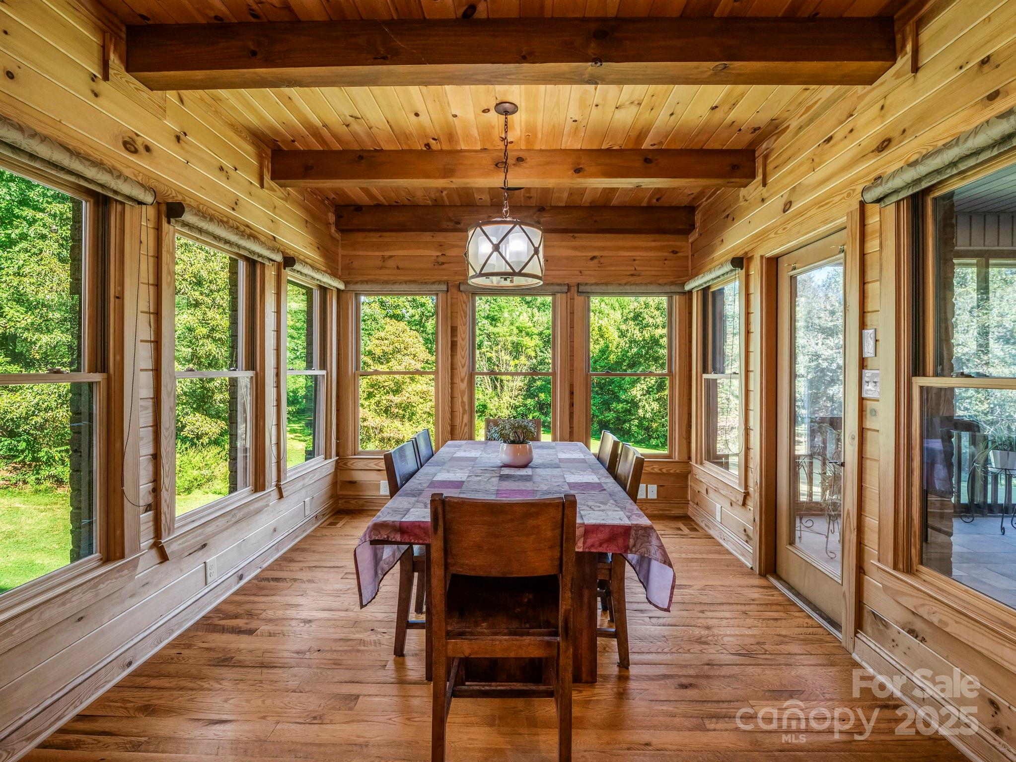 1235 Bob Falls Road Shelby, NC 28150 - Photo 14 of 47 a dining room with furniture window wooden floor