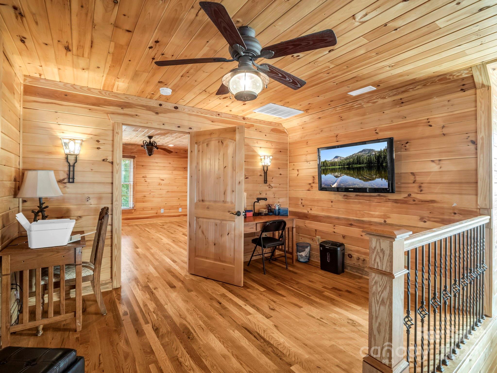 1235 Bob Falls Road Shelby, NC 28150 - Photo 27 of 47 a view of a livingroom with furniture and a flat screen tv