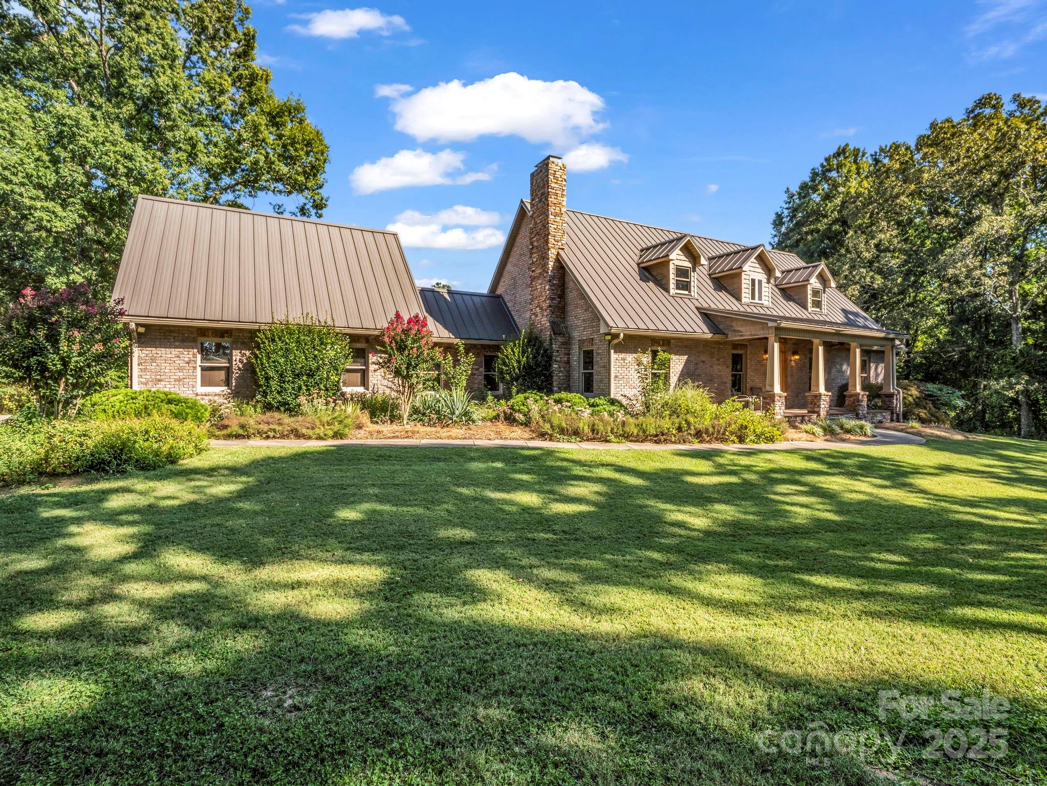 1235 Bob Falls Road Shelby, NC 28150 - Photo 4 of 47 a front view of a house with a garden