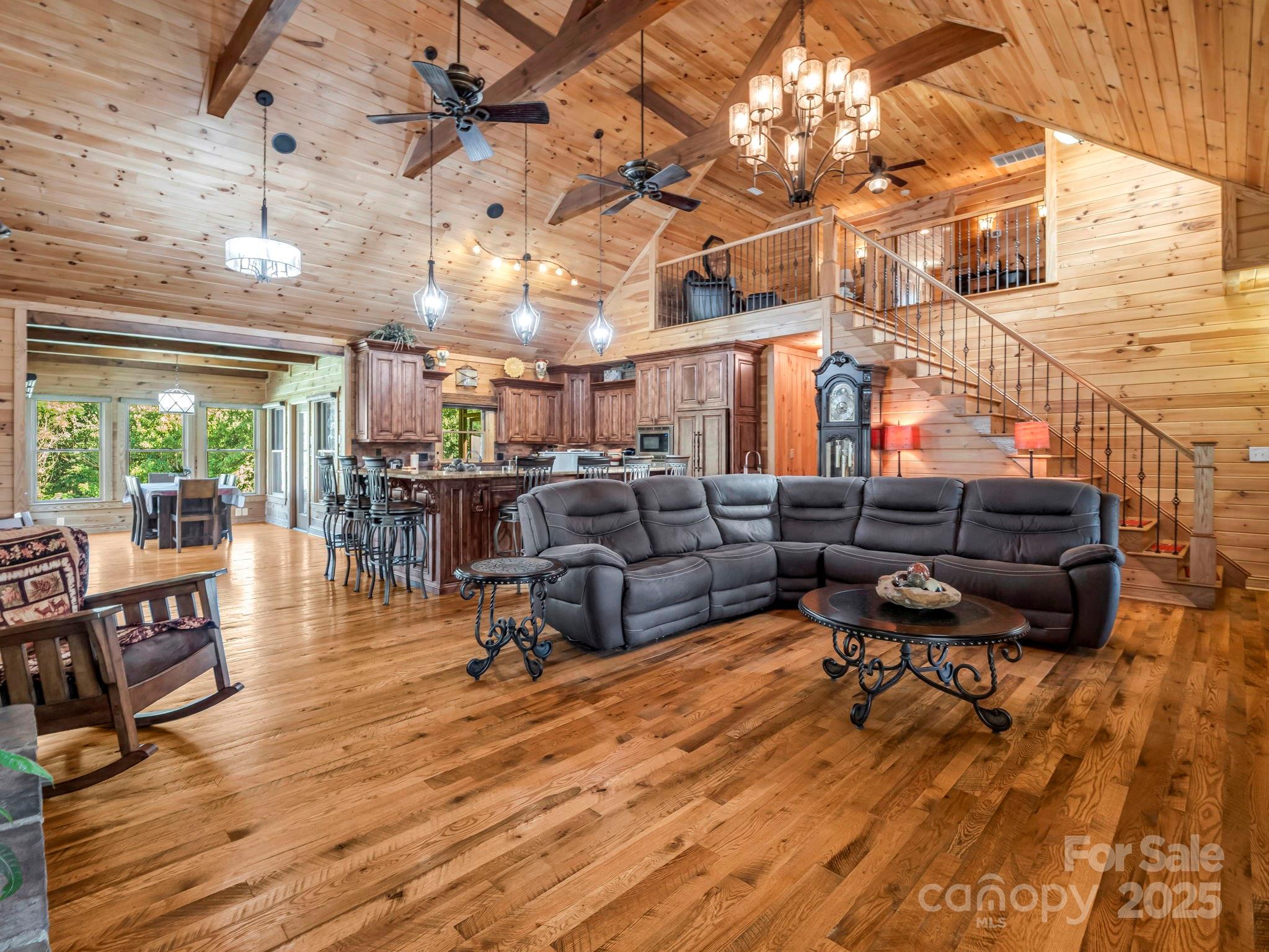1235 Bob Falls Road Shelby, NC 28150 - Photo 8 of 47 a living room with lots of furniture and a wooden floor