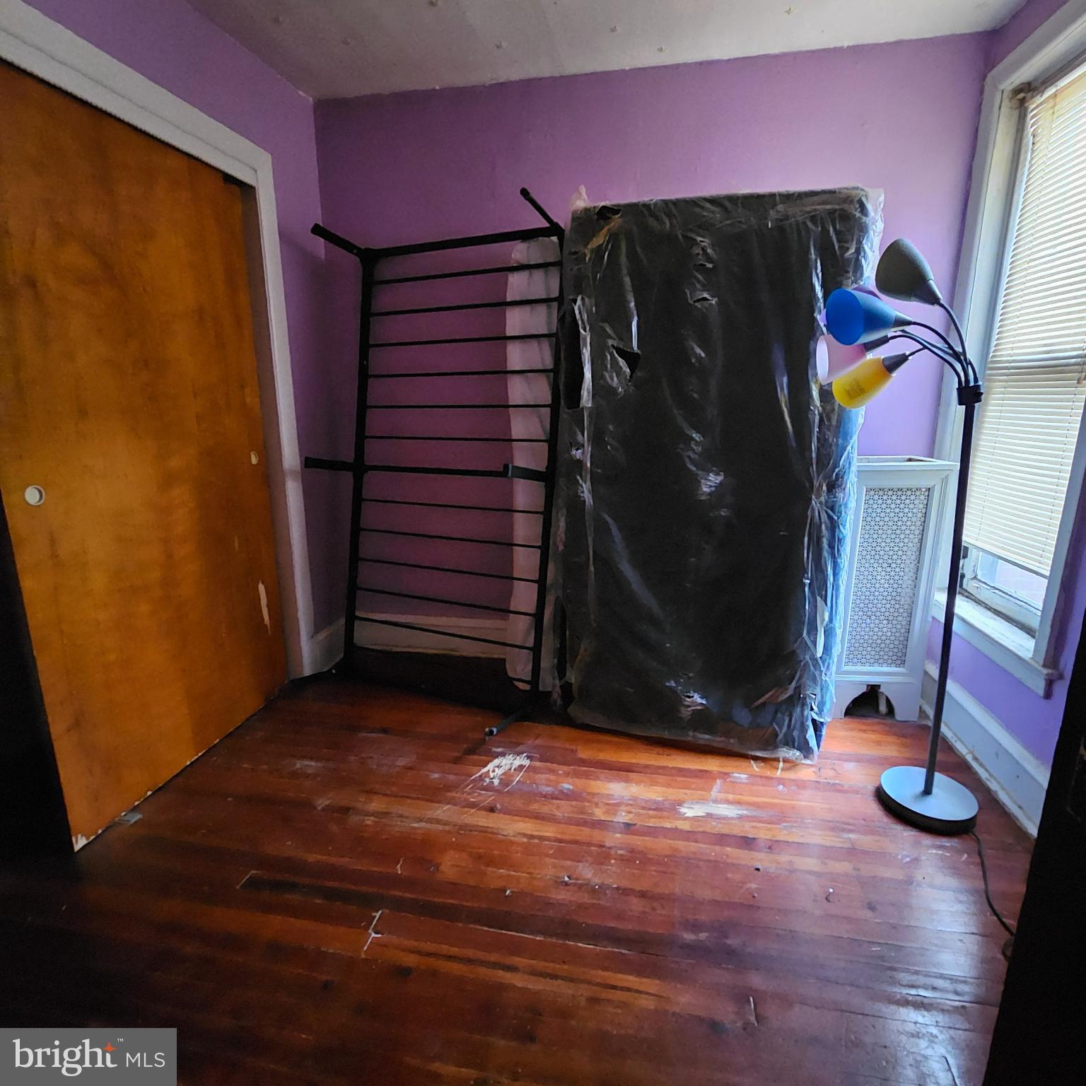 144 Fern Street Philadelphia, PA 19120 - Photo 10 of 12 a view of walk in closet with clothes and shoes