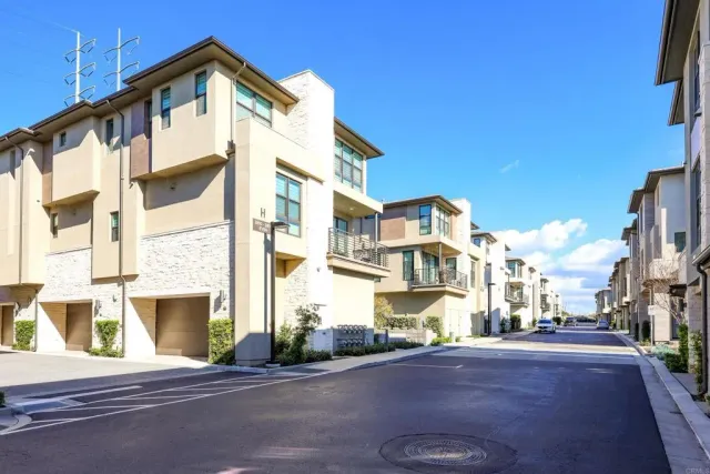 a view of balcony with furniture and a yard