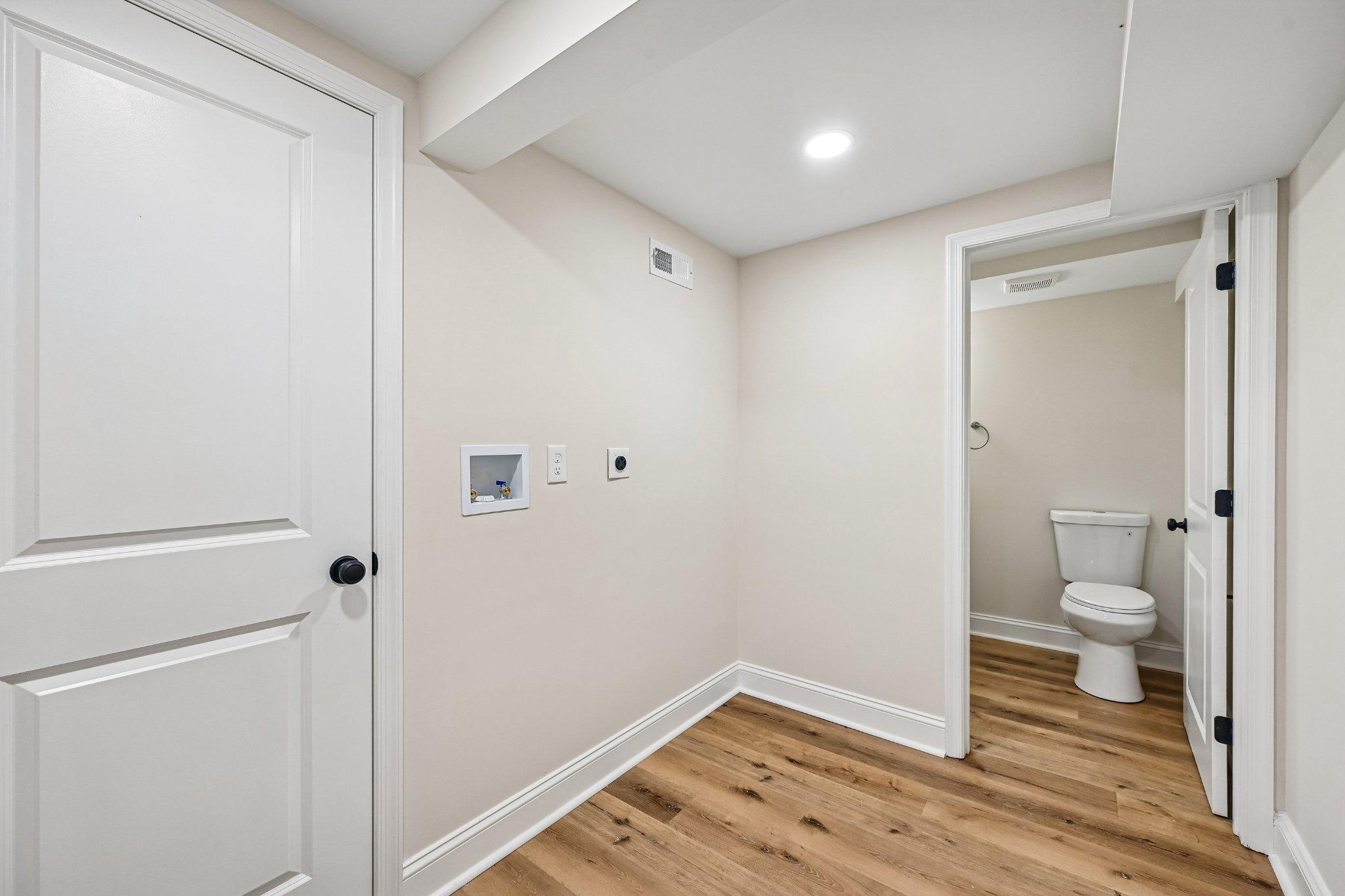 5714 Rusk Avenue Baltimore, MD 21215 - Photo 37 of 51 laundry and half bath