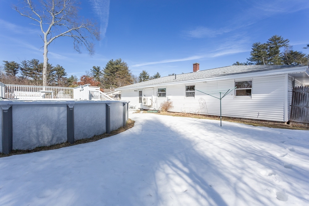 21 Sully Road Raynham, MA 02767 - Photo 3 of 22 a view of a parking space in a house