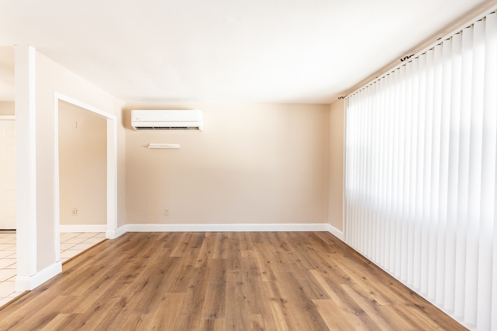 21 Sully Road Raynham, MA 02767 - Photo 8 of 22 a view of a room with wooden floor