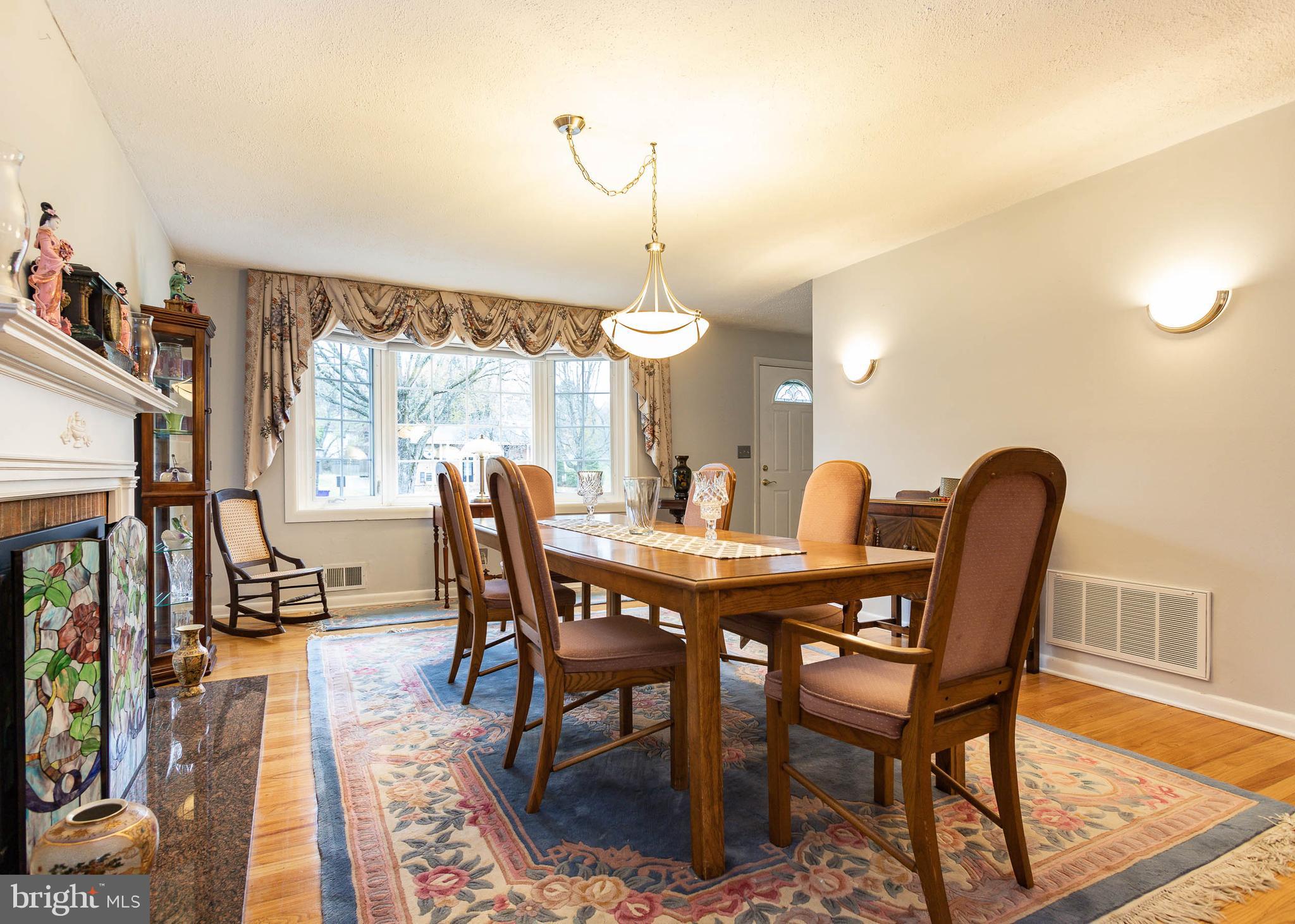 4037 High Point Road Ellicott City, MD 21042 - Photo 14 of 64 Dining Room with fireplace