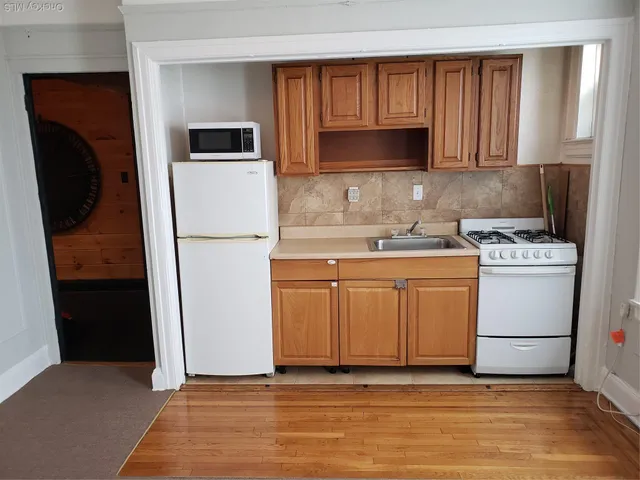a utility room with washer and dryer