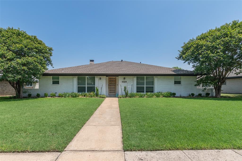 2409 Delmar Drive Plano, TX 75075 - Photo 1 of 1 a front view of a house with a yard and porch