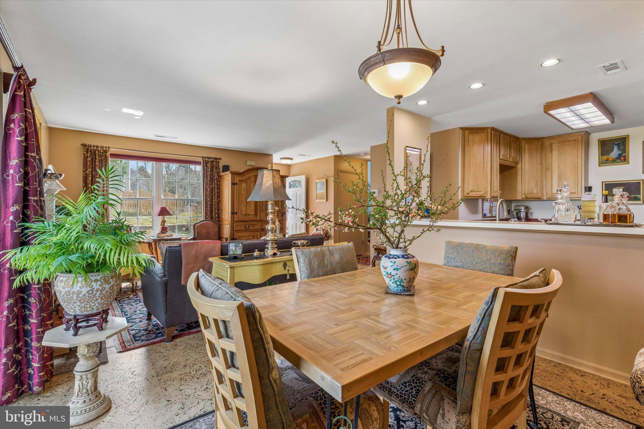 107 Carousel Circle Doylestown, PA 18901 - Photo 10 of 31 a dining room with furniture and a chandelier