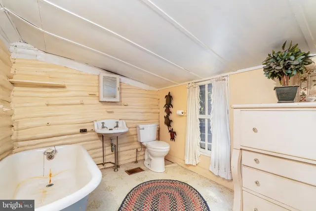 a bathroom with a sink and a bathtub