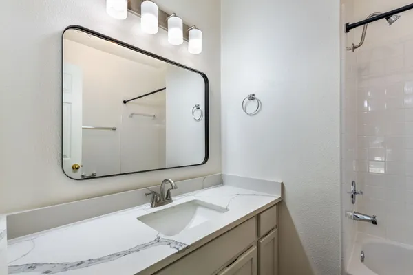 a bathroom with a bathtub