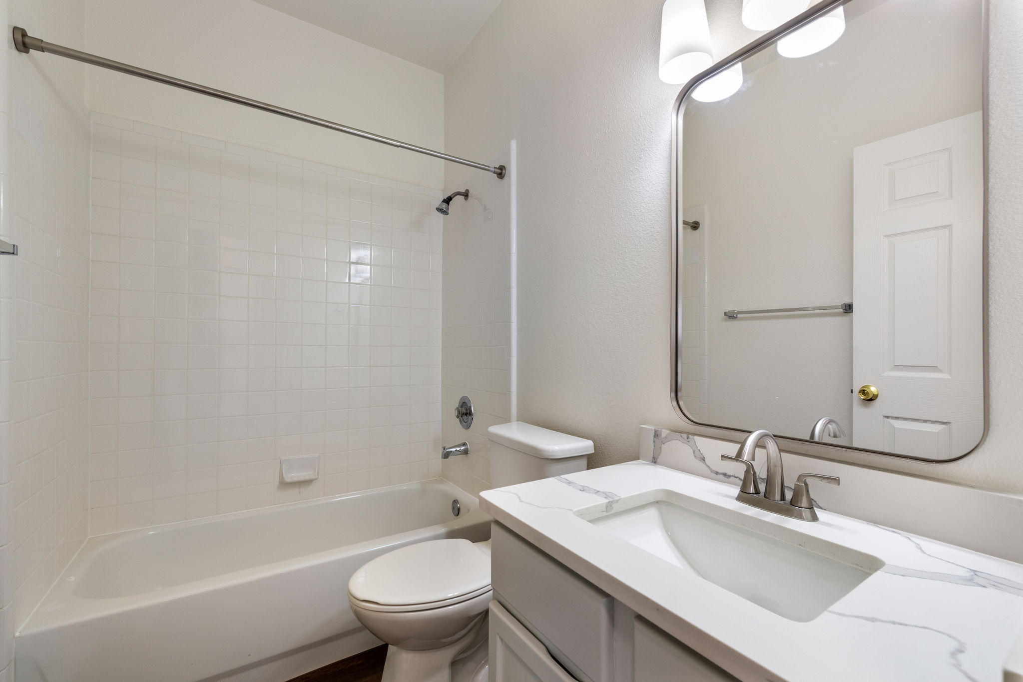 8708 Weiser Drive, Unit B Austin, TX 78729 - Photo 22 of 30 a bathroom with a sink toilet tub and shower