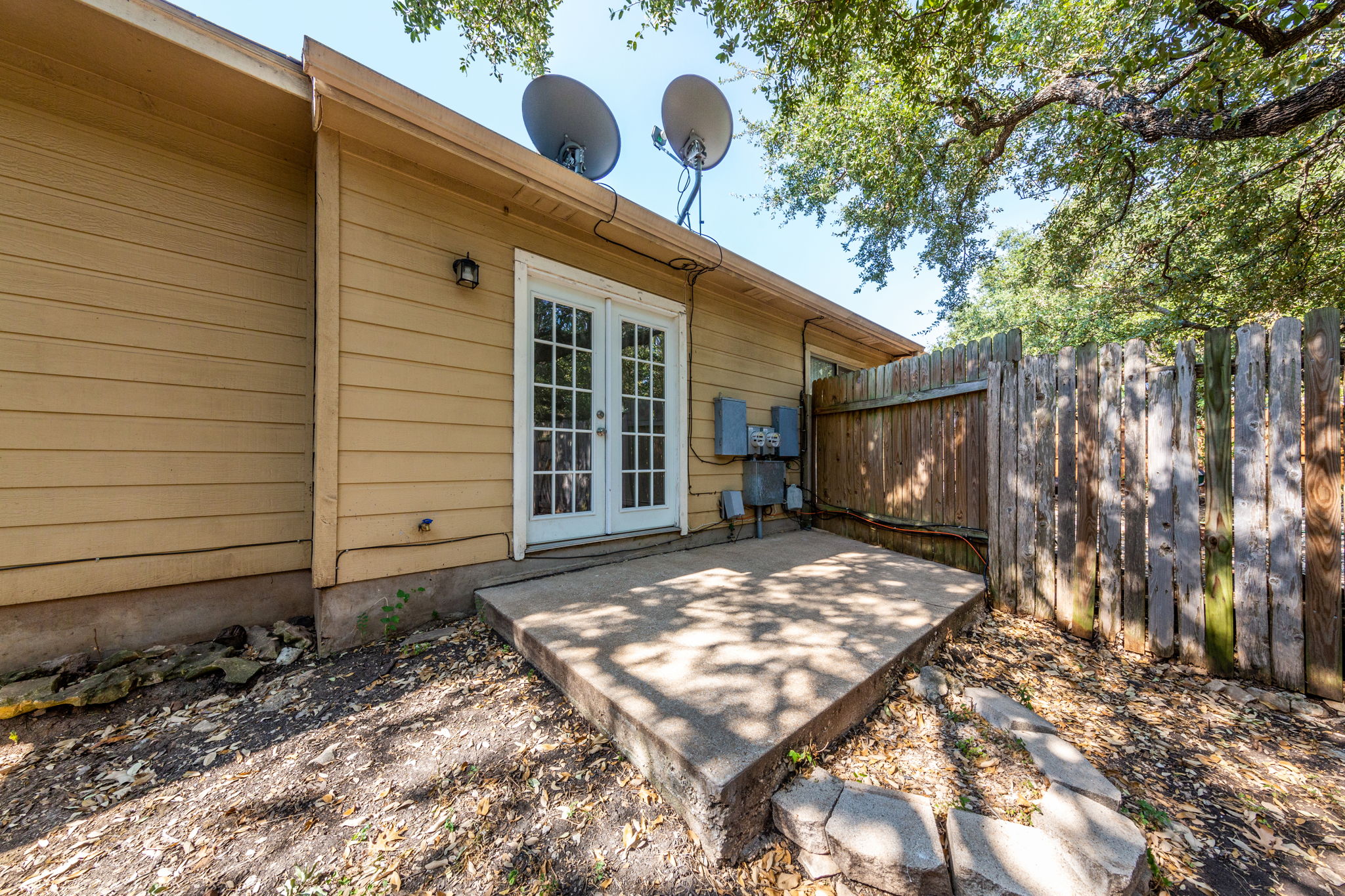 8708 Weiser Drive, Unit B Austin, TX 78729 - Photo 26 of 30 a view of backyard of the house
