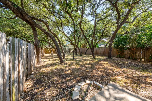 a view of outdoor space with deck and tree