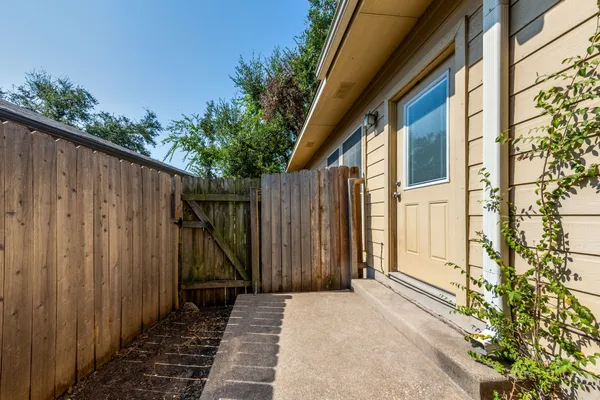 a house with trees in the background