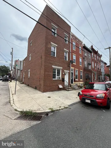 a car parked in front of a building