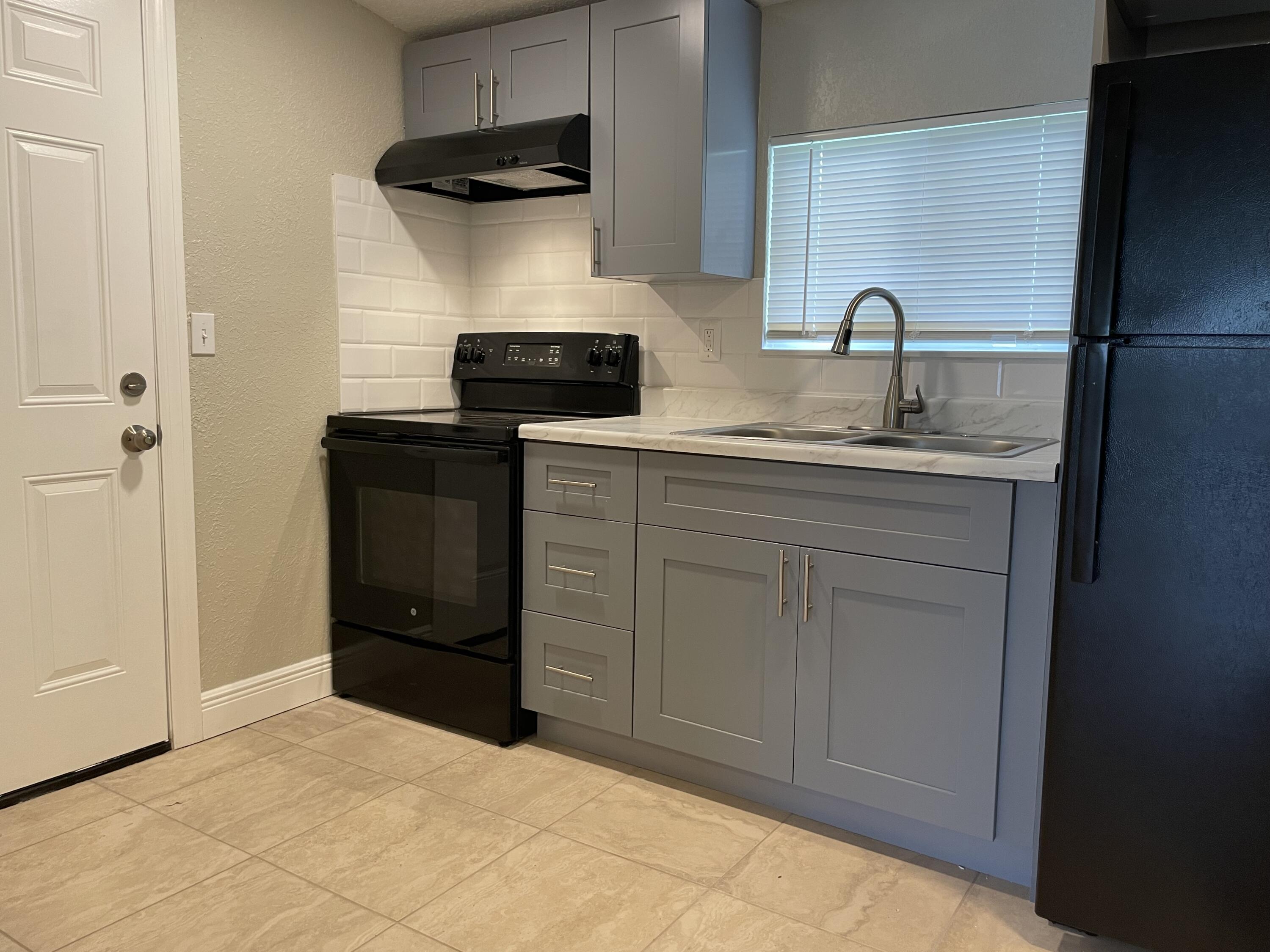 5004 Killarney Avenue, Unit A Fort Pierce, FL 34951 - Photo 4 of 16 IMG_5125