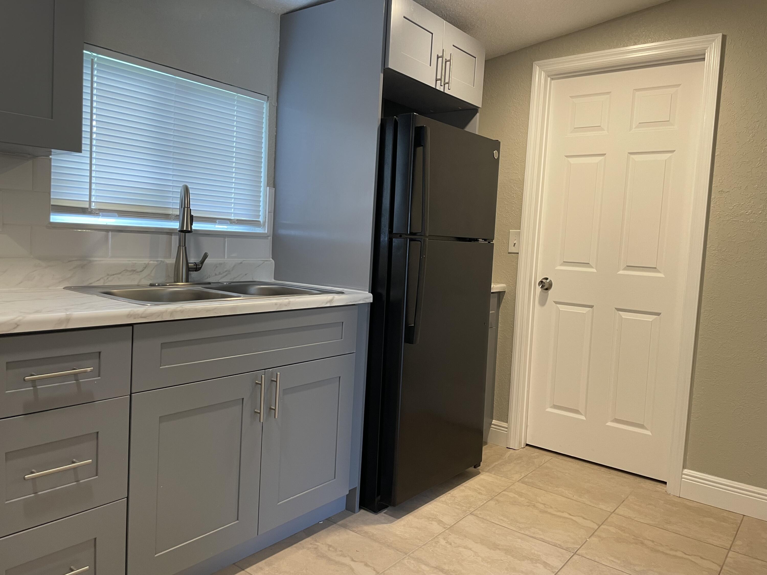 5004 Killarney Avenue, Unit A Fort Pierce, FL 34951 - Photo 5 of 16 IMG_5126