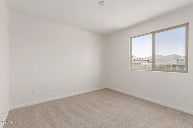 a bathroom with a double vanity sink mirror and bathtub