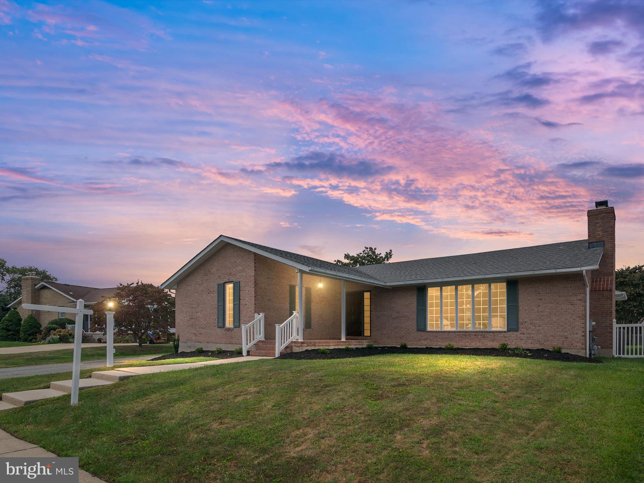 9212 Gardenia Road Baltimore, MD 21236 - Photo 3 of 44 a front view of a house with a garden