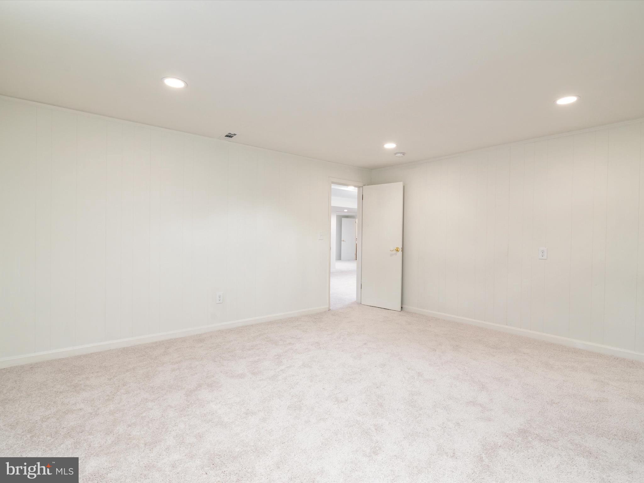 9212 Gardenia Road Baltimore, MD 21236 - Photo 32 of 44 an empty room with an entryway