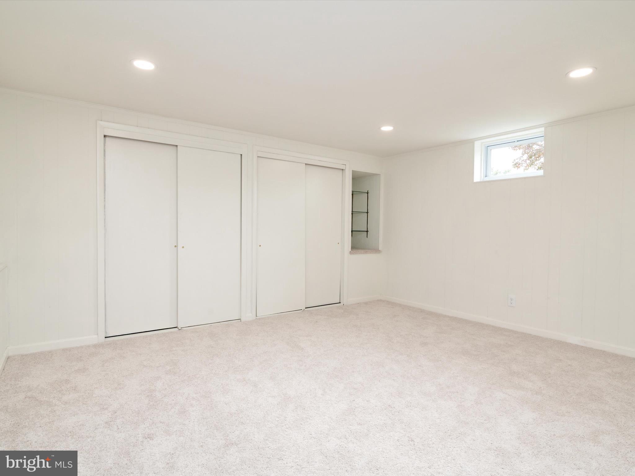 9212 Gardenia Road Baltimore, MD 21236 - Photo 33 of 44 an empty room with windows