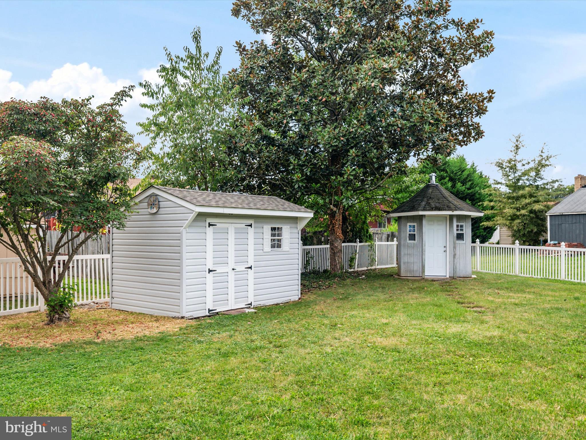 9212 Gardenia Road Baltimore, MD 21236 - Photo 38 of 44 front view of a house with a yard