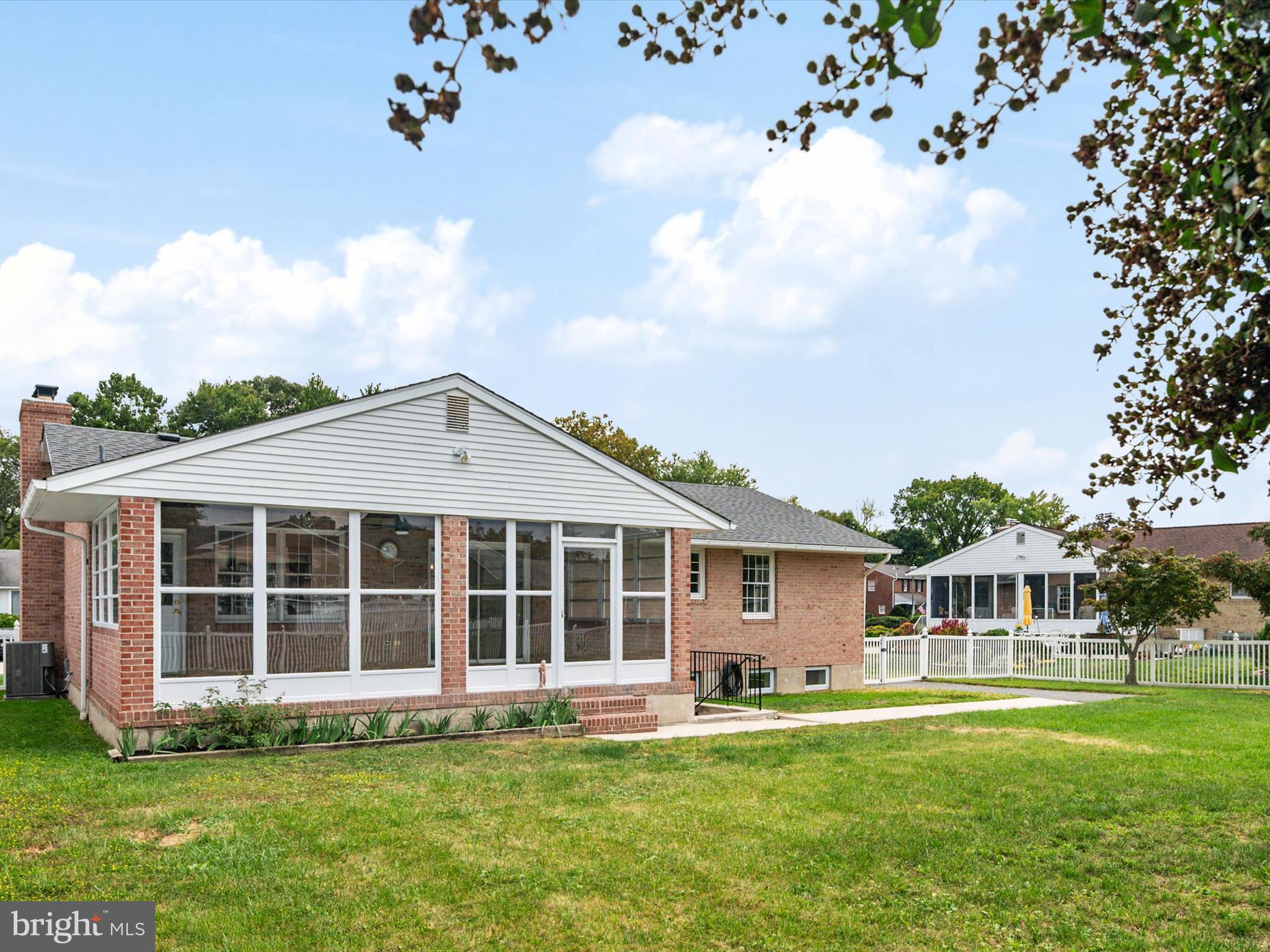 9212 Gardenia Road Baltimore, MD 21236 - Photo 40 of 44 a front view of a house with a garden