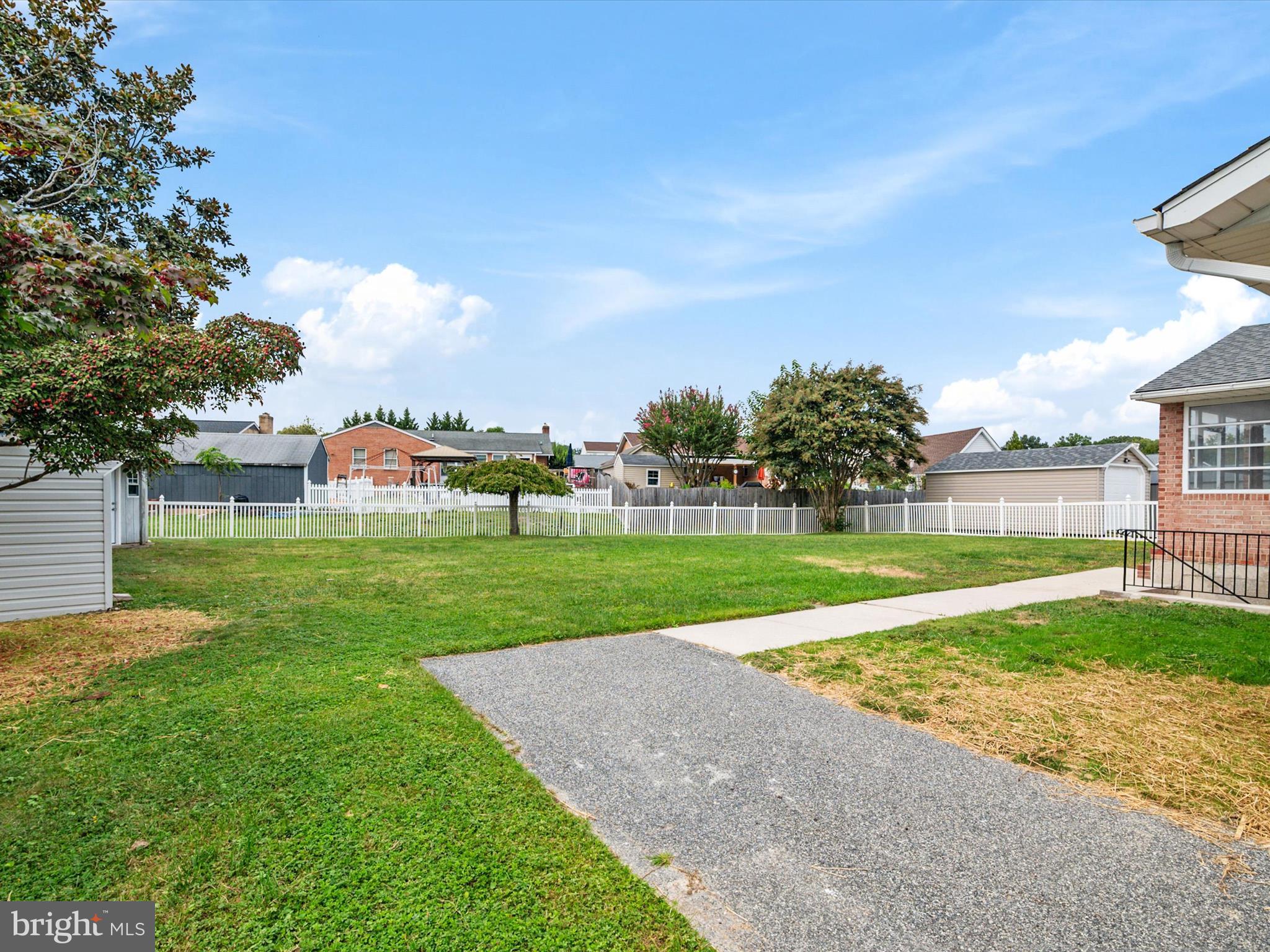 9212 Gardenia Road Baltimore, MD 21236 - Photo 41 of 44 a view of a park and trees in the background