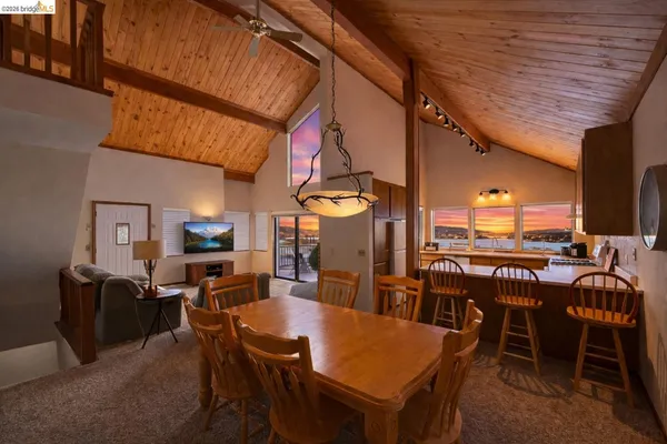 a view of a dining room with furniture