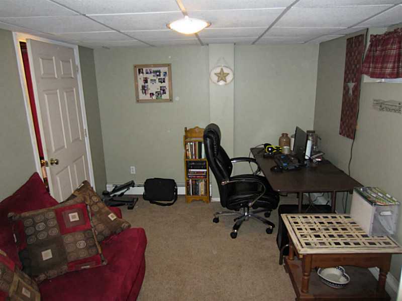 66 Fulton Street Woonsocket, RI 02895 - Photo 11 of 16 Den/Family/Great Room. Another Room to do Whatever You Want With in the Finished Basement!