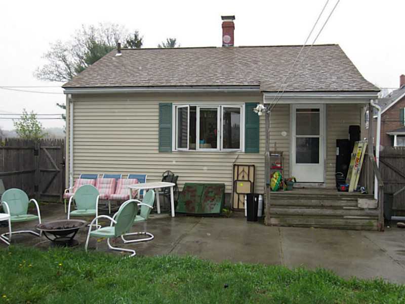 66 Fulton Street Woonsocket, RI 02895 - Photo 12 of 16 Exterior Back. Covered Porch and Cement Patio, Enjoy!