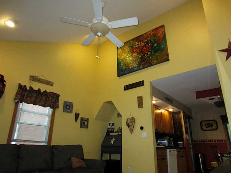 66 Fulton Street Woonsocket, RI 02895 - Photo 5 of 16 Living Room. The Cathedral Ceiling Gives You a Nice Open Feel!