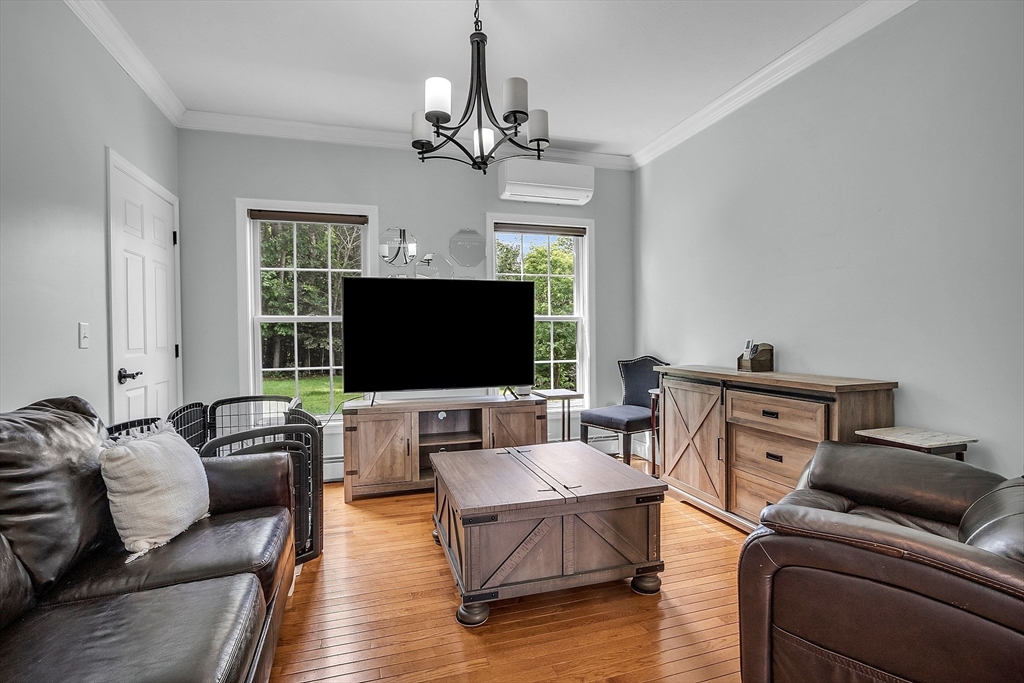 22 French Road Templeton, MA 01468 - Photo 15 of 42 a living room with furniture and a flat screen tv