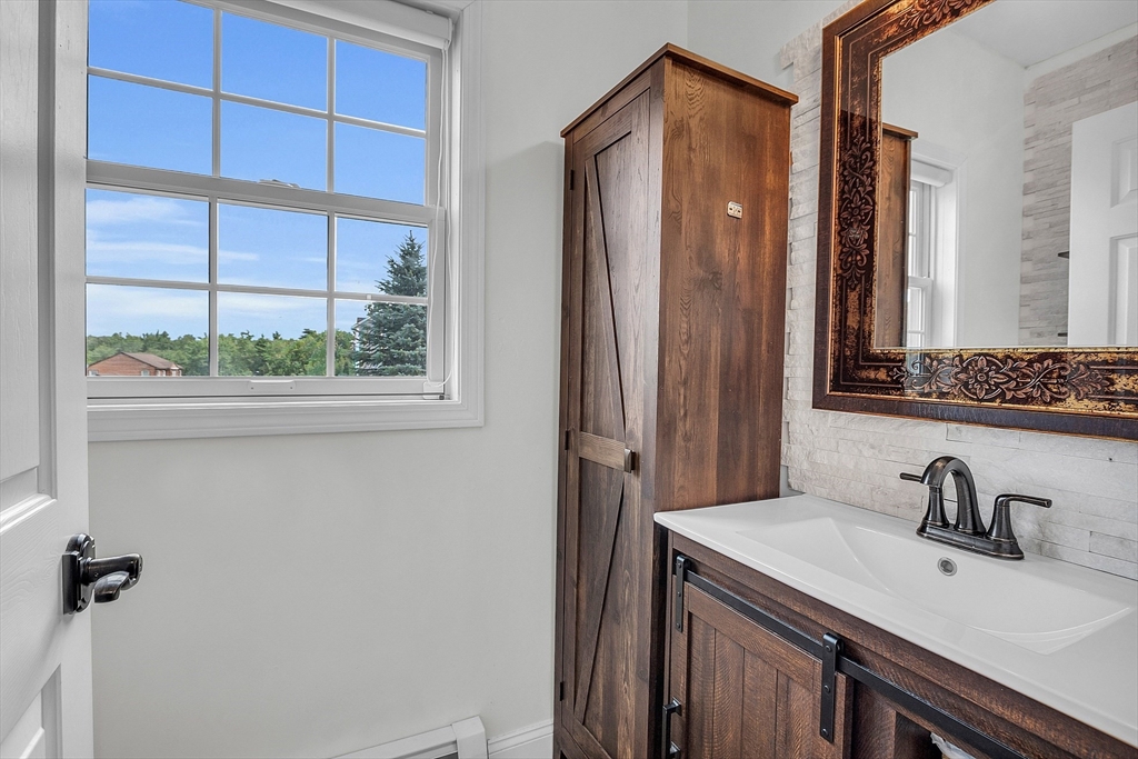 22 French Road Templeton, MA 01468 - Photo 17 of 42 a bathroom with a sink and a mirror