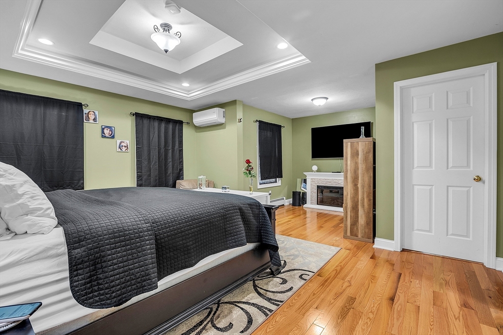 22 French Road Templeton, MA 01468 - Photo 18 of 42 a bed room with a bed and a chandelier