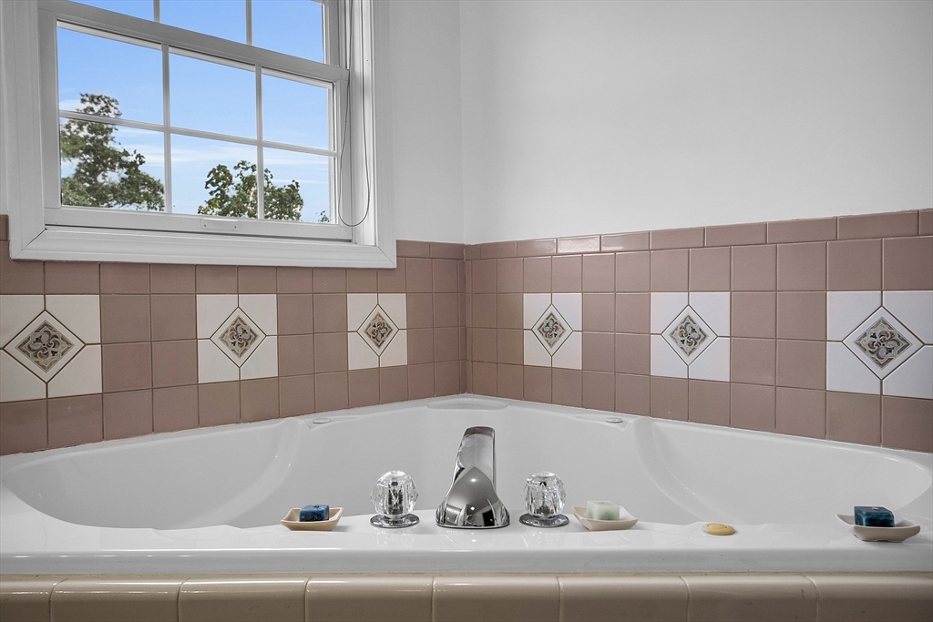 22 French Road Templeton, MA 01468 - Photo 23 of 42 a bathroom with a bathtub and window
