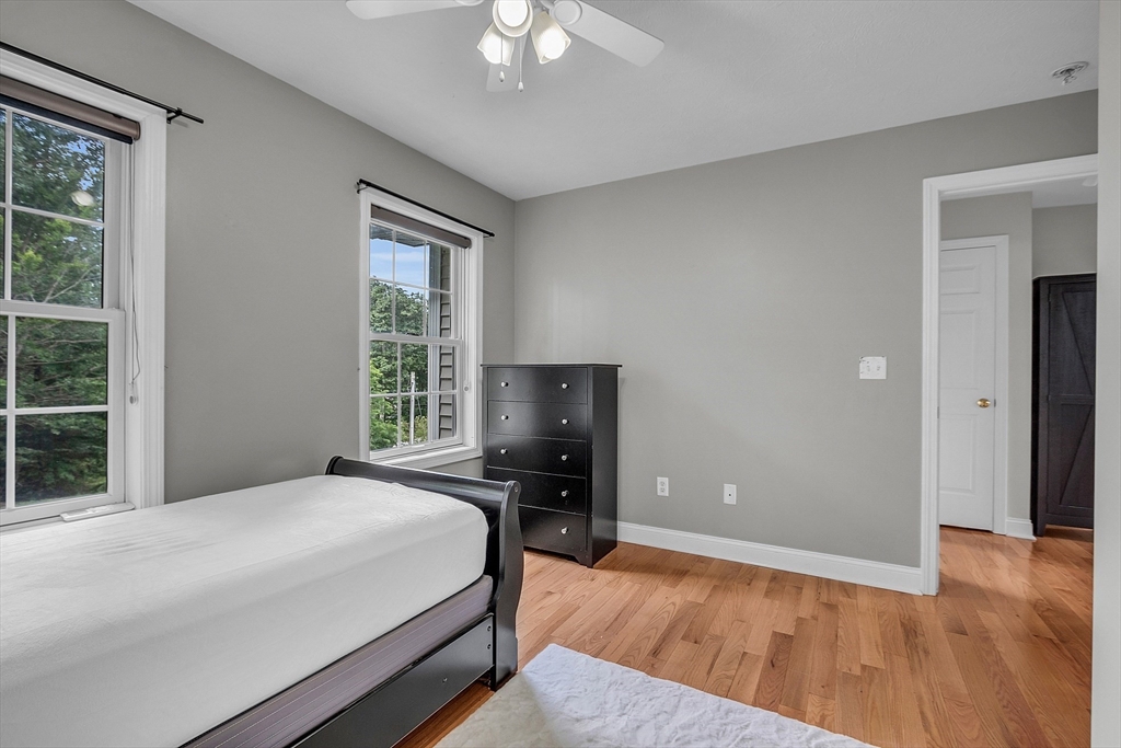 22 French Road Templeton, MA 01468 - Photo 27 of 42 a bedroom with a bed and wooden floor