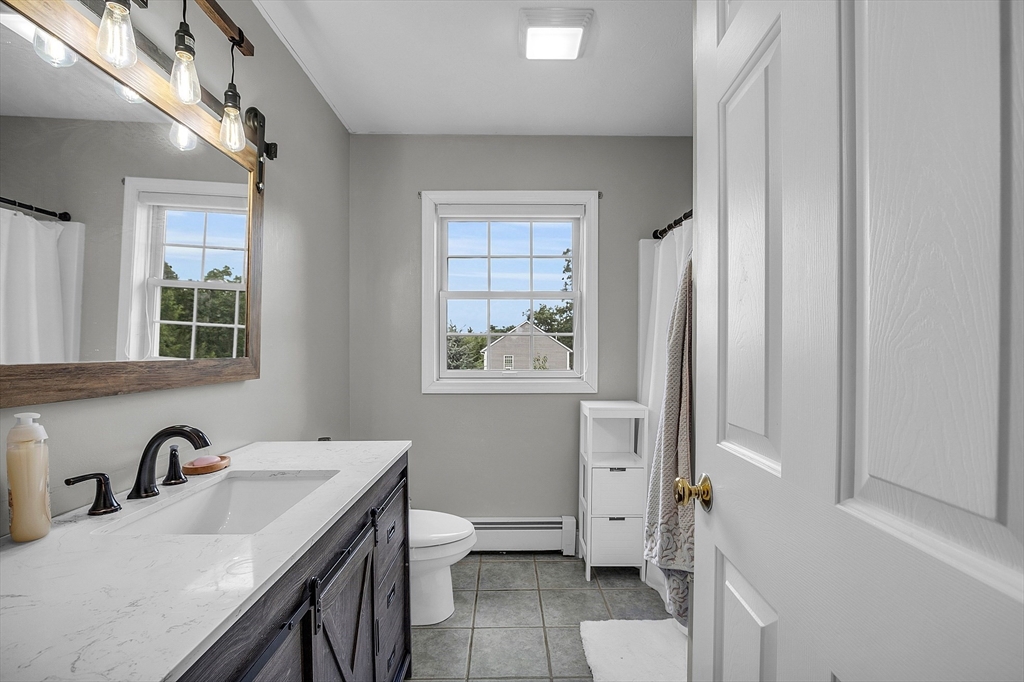 22 French Road Templeton, MA 01468 - Photo 28 of 42 a bathroom with a granite countertop sink toilet and shower