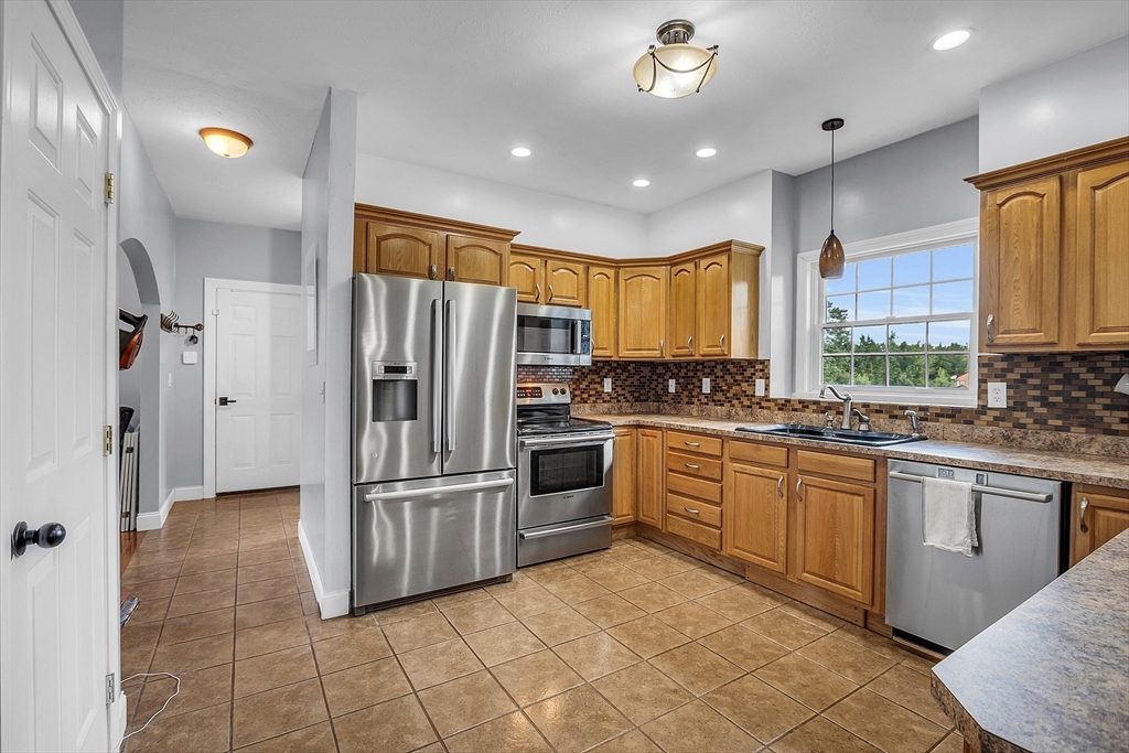 22 French Road Templeton, MA 01468 - Photo 6 of 42 a kitchen with stainless steel appliances granite countertop a refrigerator and a stove top oven