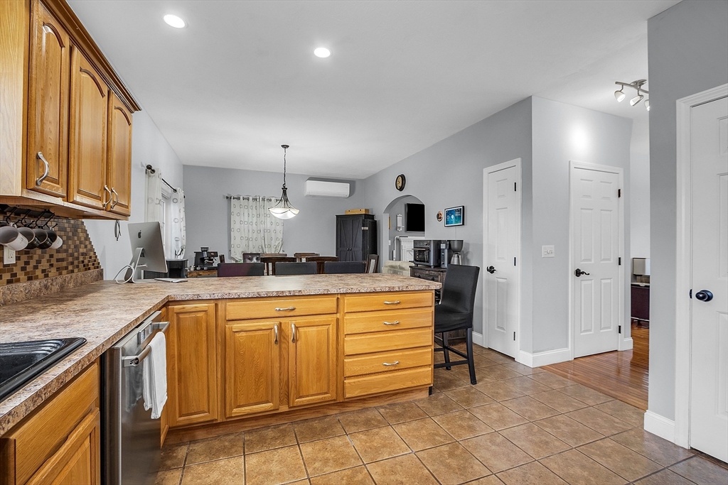 22 French Road Templeton, MA 01468 - Photo 8 of 42 a large kitchen with stainless steel appliances granite countertop a sink and cabinets