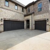 a front view of a house with yard